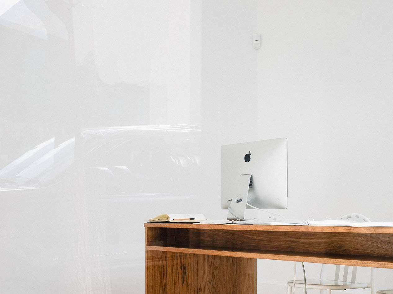iMac on a desk in a modern workspace